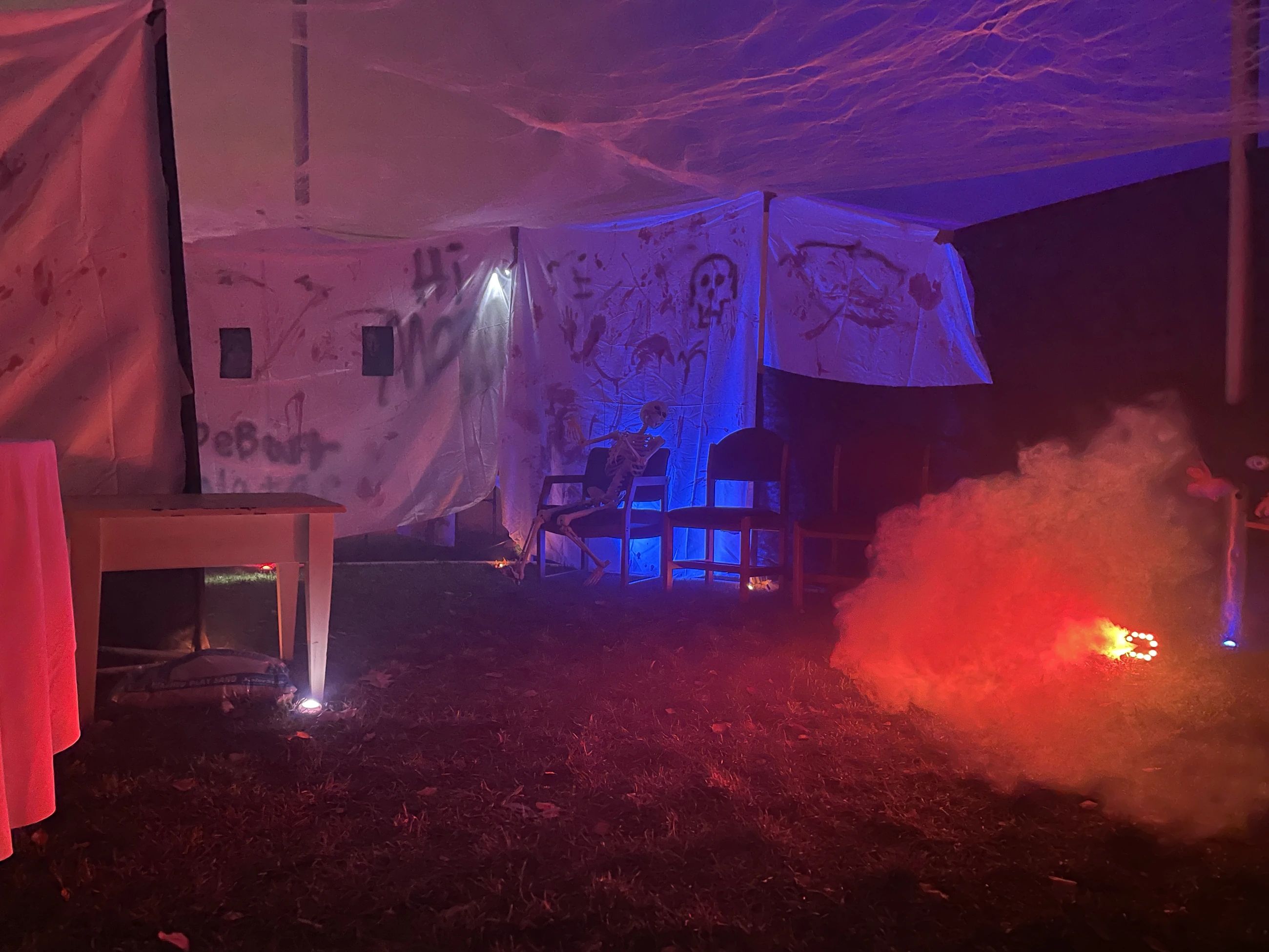 Lighting, fabric and theatrical fog establish the temporary Hospital attraction. Notre Dame Themed Entertainment Association student team.